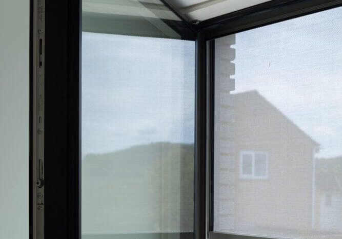 exterior blind installed to full height first floor window with Juliet balcony